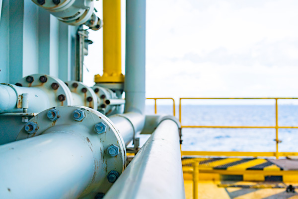 Steel piping system with bolted flanges on an offshore platform used in oil and gas applications